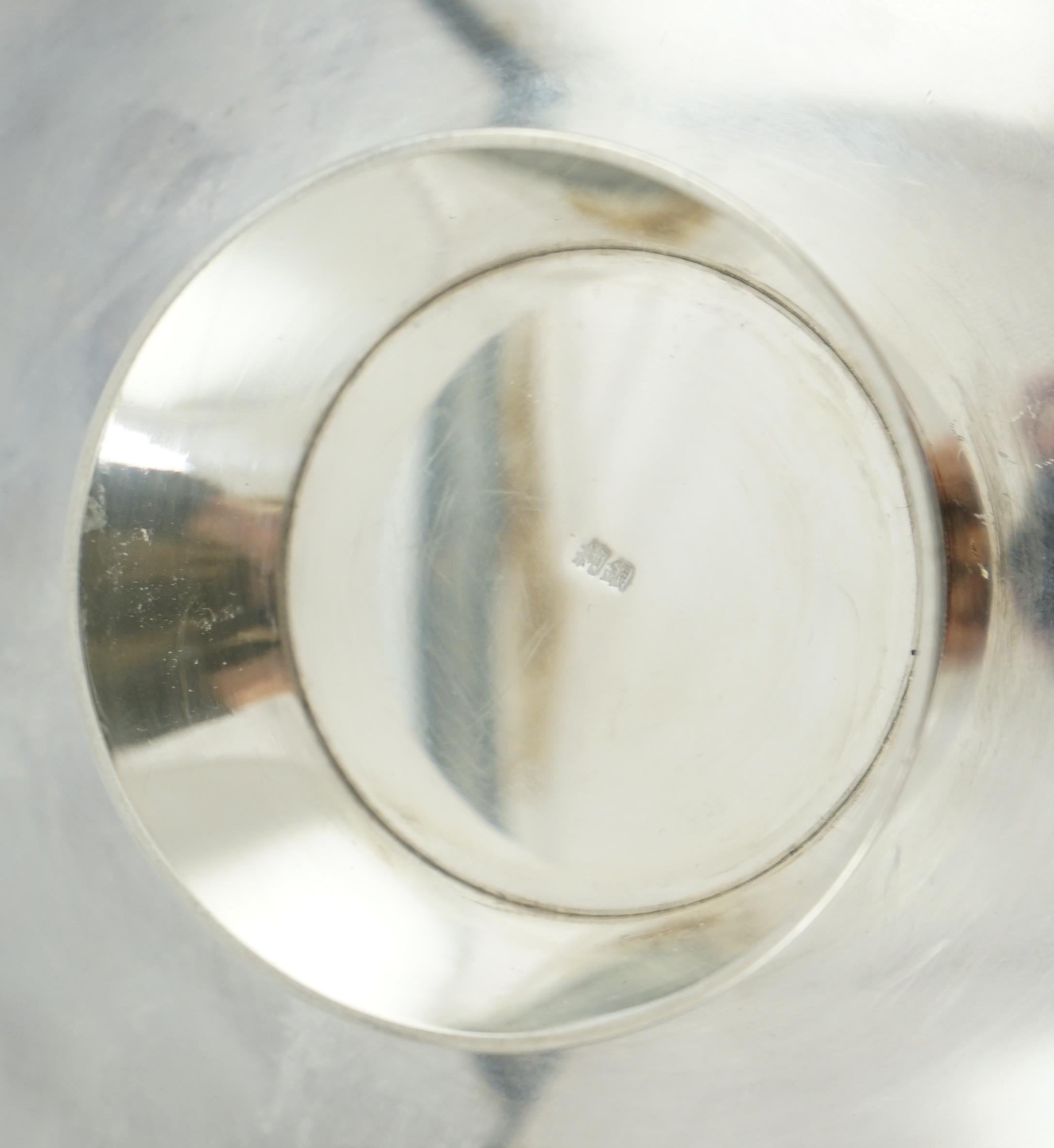 A heavy Japanese silver stem dish, early 20th century, stamped mark ‘jungin’ (pure silver)